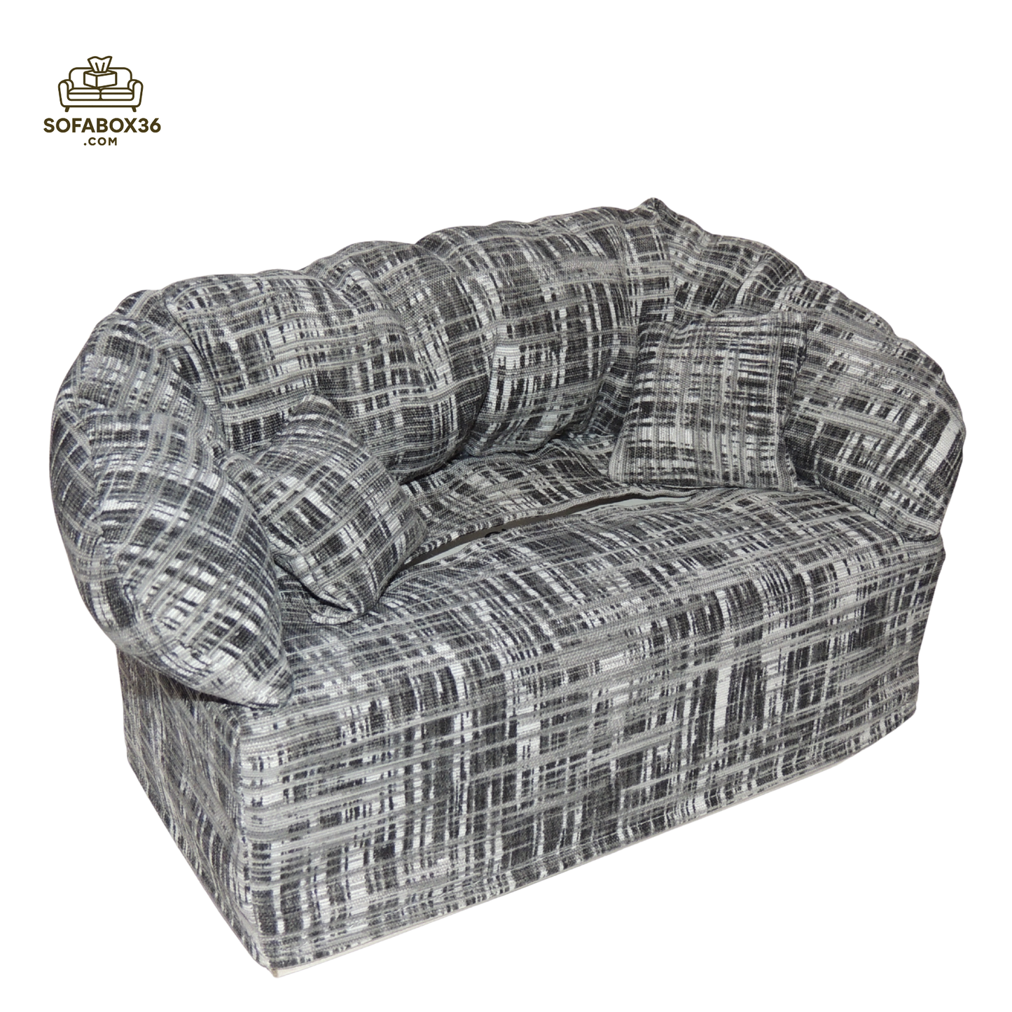 Tissue box cover depicted as a sofa (black and white).