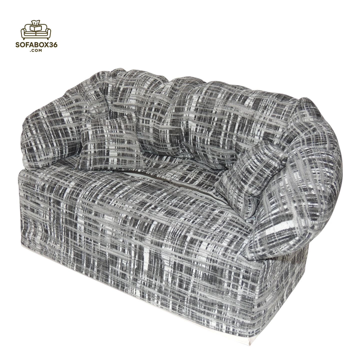 Tissue box cover depicted as a sofa (black and white).