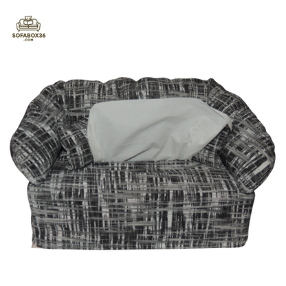 Tissue box cover depicted as a sofa (black and white).